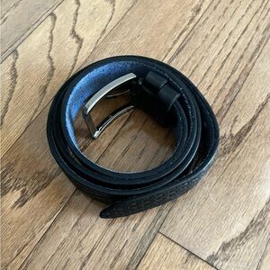 NWOT black leather belt with silver-tone hardware 50” long